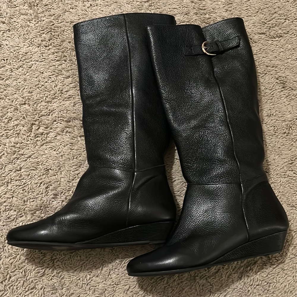 black boots with gold buckle